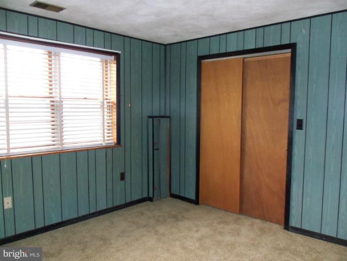 8010 Sagramore Road Rosedale, MD 21237 - Photo 14 of 14 a view of an empty room with window