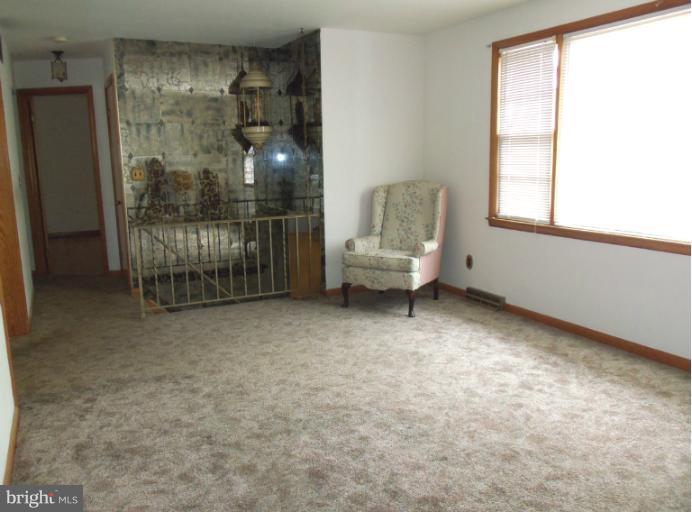 8010 Sagramore Road Rosedale, MD 21237 - Photo 3 of 14 a living room with furniture and a window