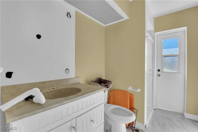 $499,900 | 521 Grant Avenue, Lehigh Acres, FL 33972