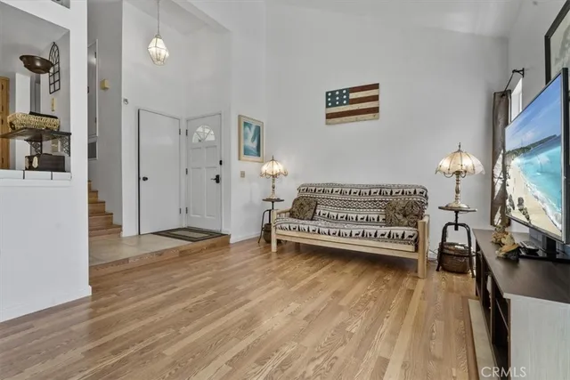 a view of a patio with iron fence
