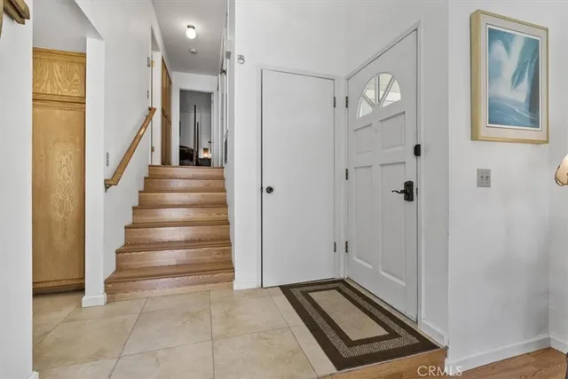 a bathroom with a toilet sink and vanity
