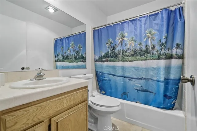 a view of a bathroom from a hallway