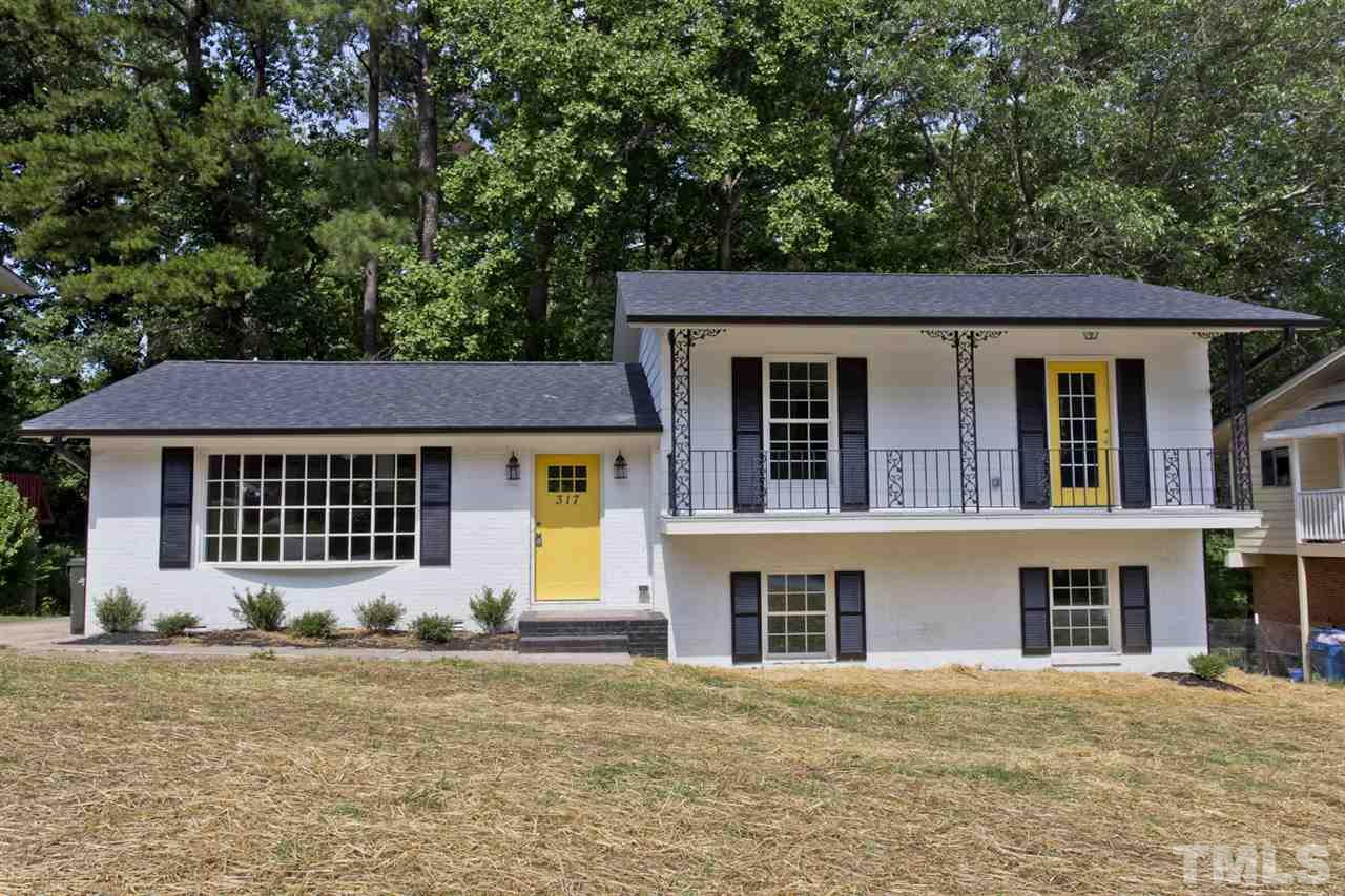 317 East Pilot Street Durham, NC 27707 - Photo 1 of 30 front view of a house with a yard