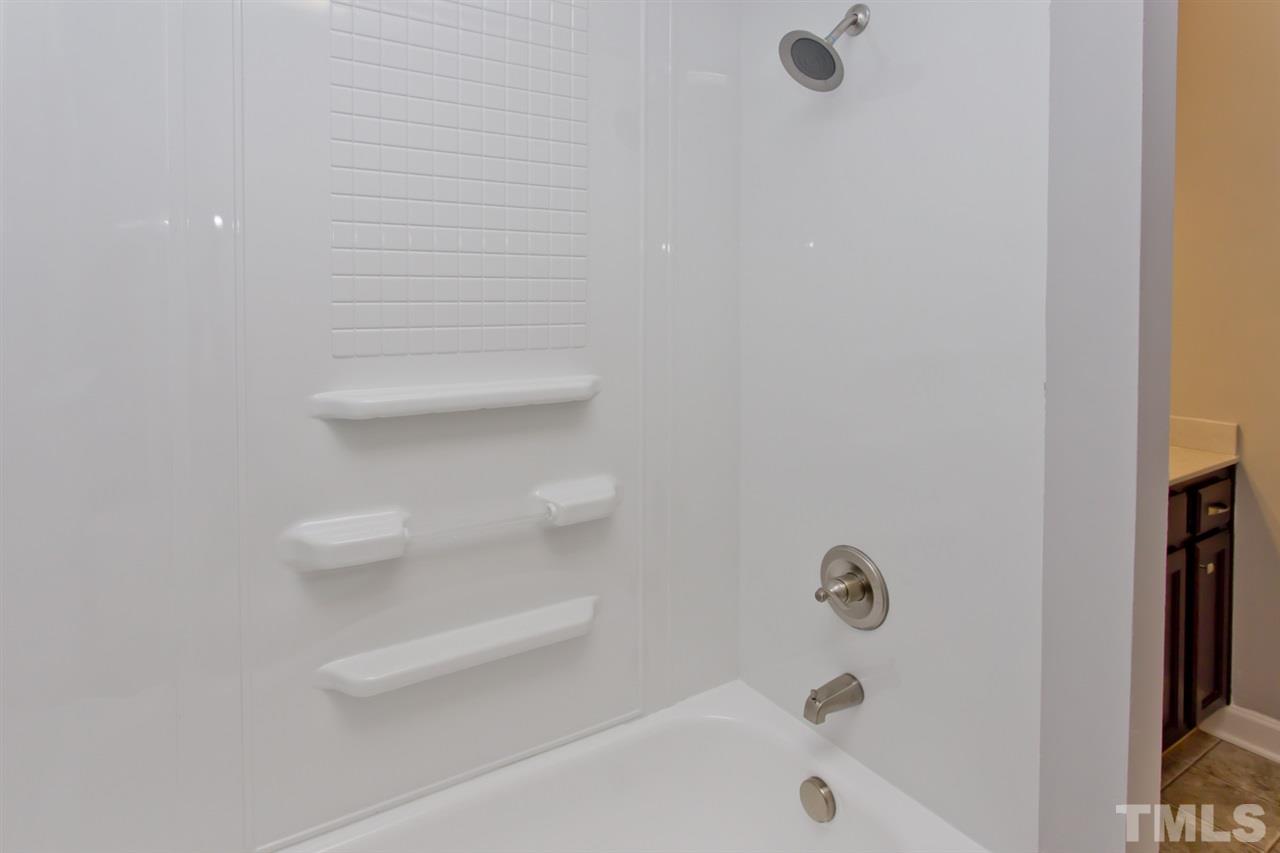 317 East Pilot Street Durham, NC 27707 - Photo 26 of 30 a bathroom with a shower