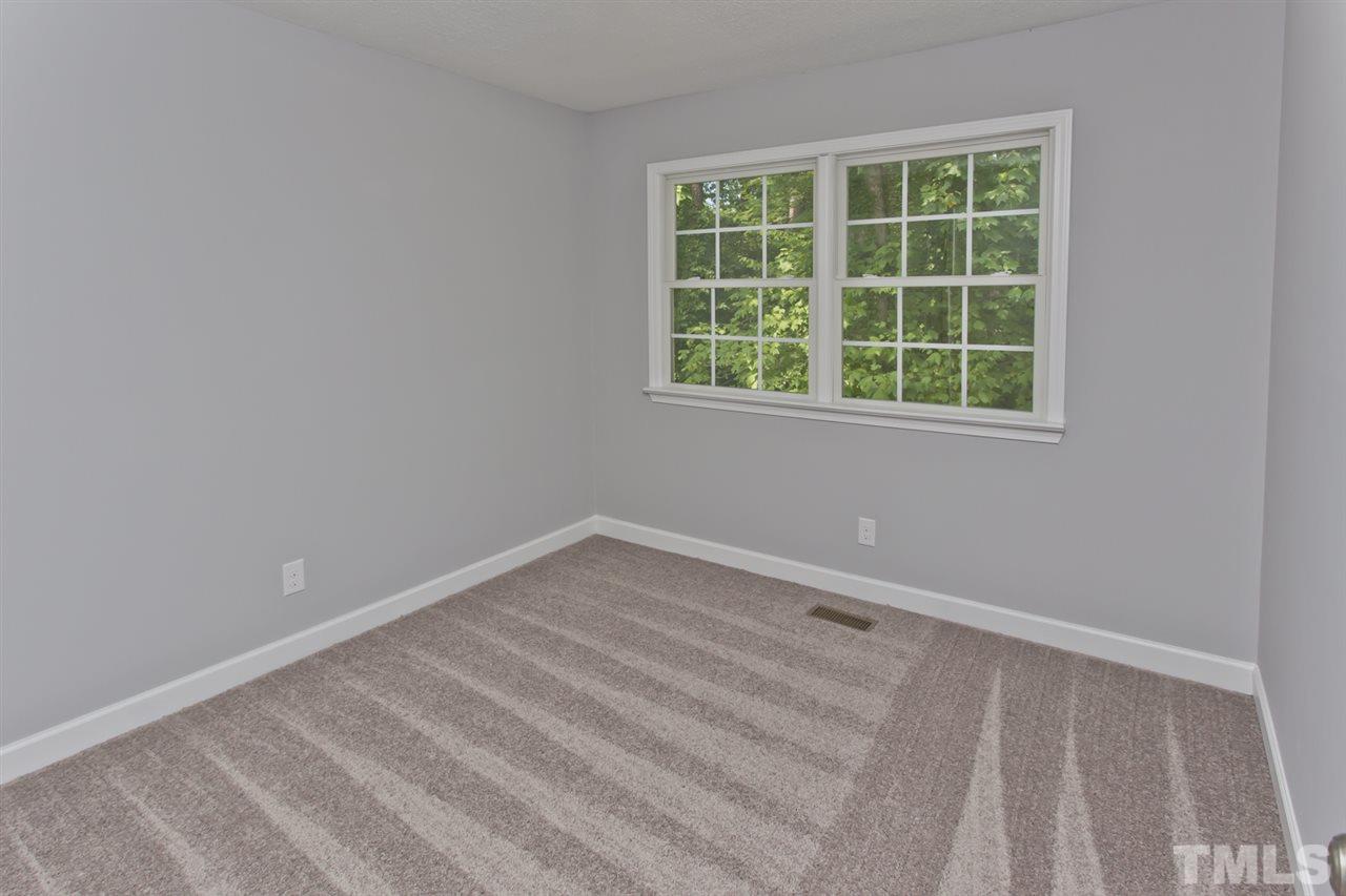 317 East Pilot Street Durham, NC 27707 - Photo 27 of 30 an empty room with a window