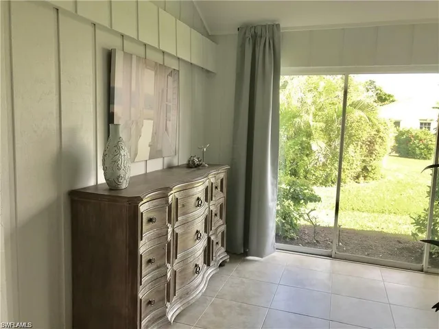 a bathroom with a tub and shower