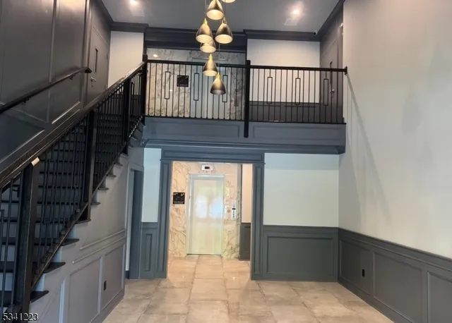 a view of entryway with a front door