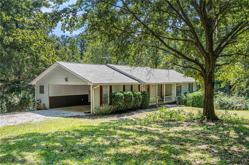 551 Hood Road Stockbridge, GA 30281 - Photo 3 of 49 front view of a house with a yard