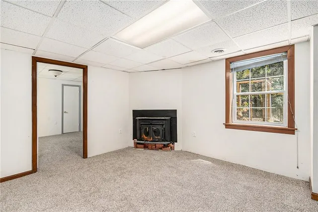 a room with a bed and a window