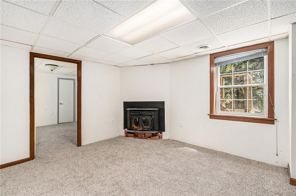 551 Hood Road Stockbridge, GA 30281 - Photo 31 of 49 a room with a bed and a window