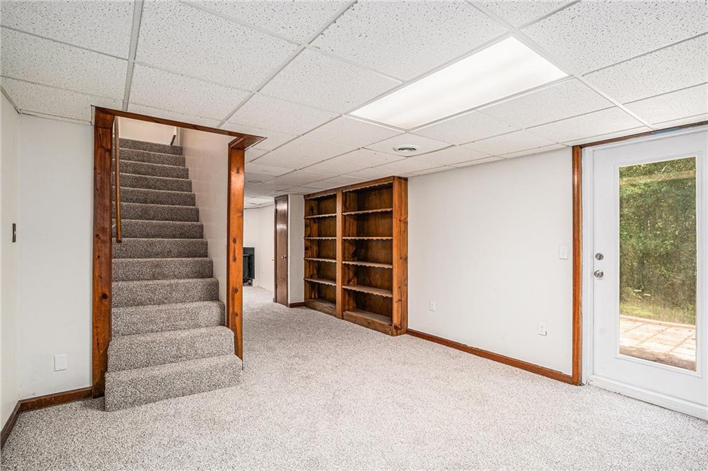 551 Hood Road Stockbridge, GA 30281 - Photo 35 of 49 a view of an empty room with a window