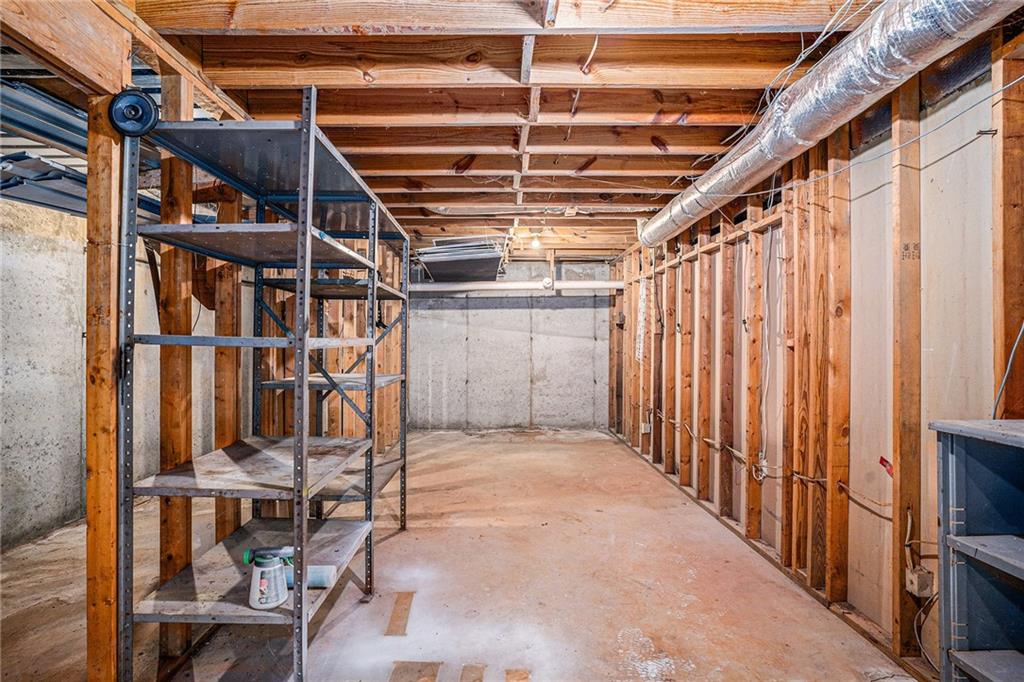 551 Hood Road Stockbridge, GA 30281 - Photo 39 of 49 a view of an empty room with wooden floor