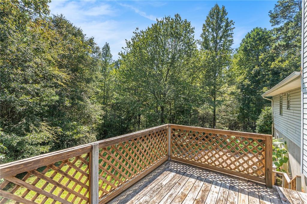 551 Hood Road Stockbridge, GA 30281 - Photo 41 of 49 a view of balcony with wooden floor
