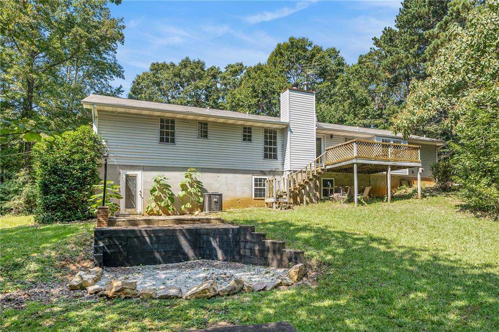 551 Hood Road Stockbridge, GA 30281 - Photo 43 of 49 a front view of a house with a yard