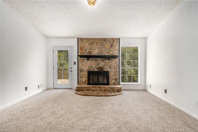 a living room with a fireplace