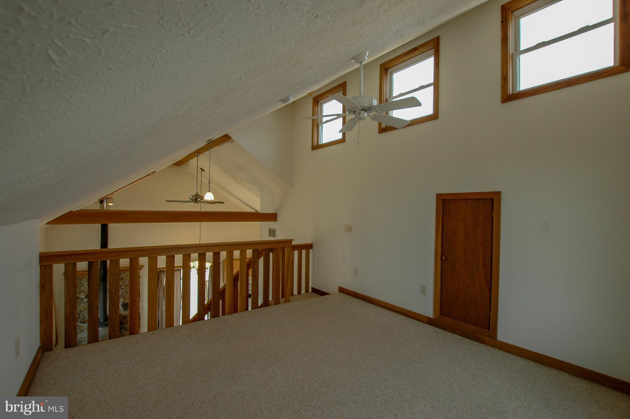 1049 Feather Road Terra Alta, WV 26764 - Photo 20 of 29 Upper Level Loft area with lots of natural light