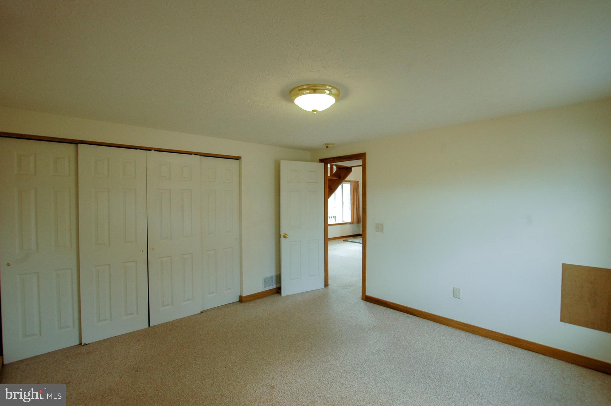 1049 Feather Road Terra Alta, WV 26764 - Photo 23 of 29 Bedroom #1 with large closet