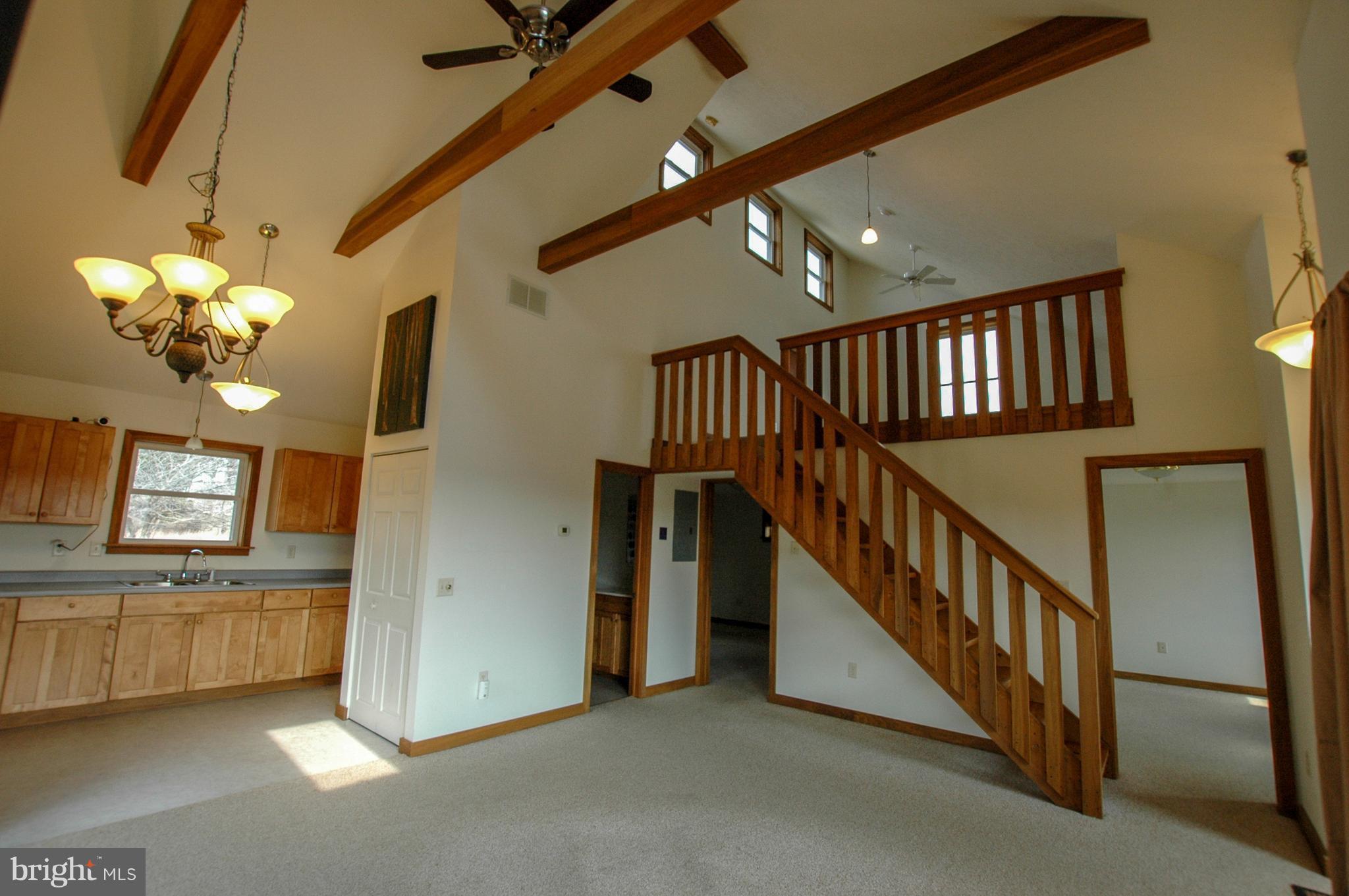 1049 Feather Road Terra Alta, WV 26764 - Photo 10 of 29 Living Room with wood burner to heat house