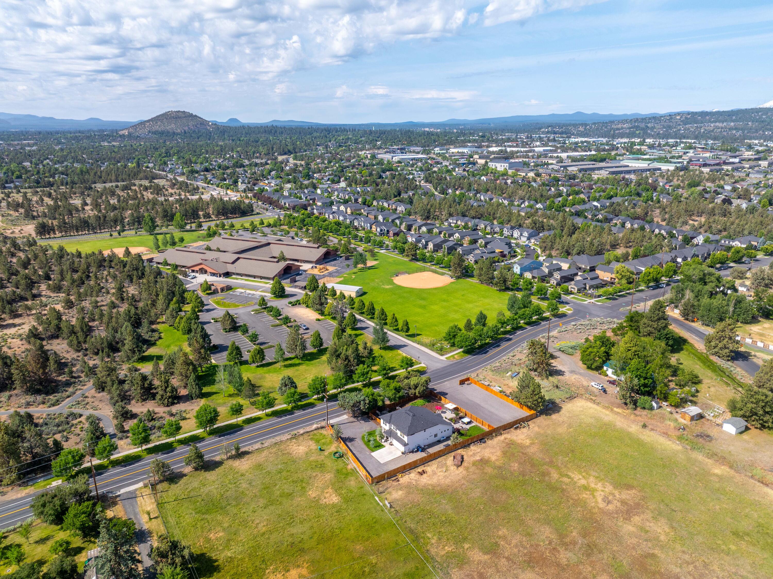 21030 Yeoman Road Bend, OR 97701 - Photo 59 of 66 an aerial view of residential houses with outdoor space