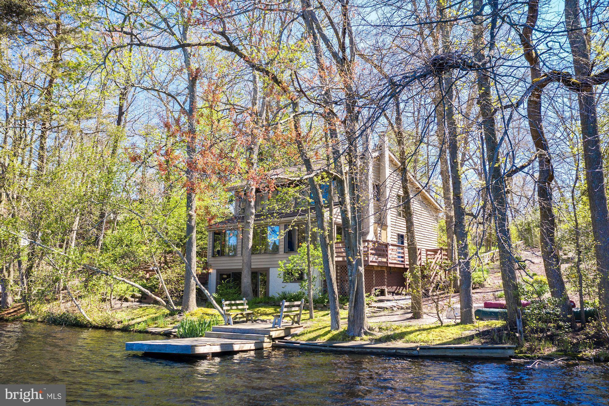 8 Robinson Road Medford, NJ 08055 - Photo 12 of 55 a view of a lake with a house