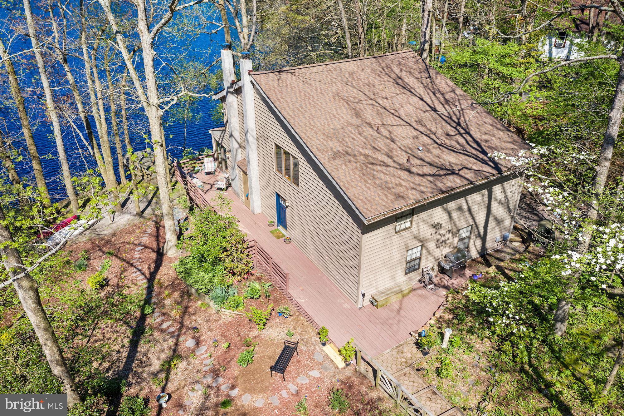 8 Robinson Road Medford, NJ 08055 - Photo 15 of 55 a view of an buildings with a backyard