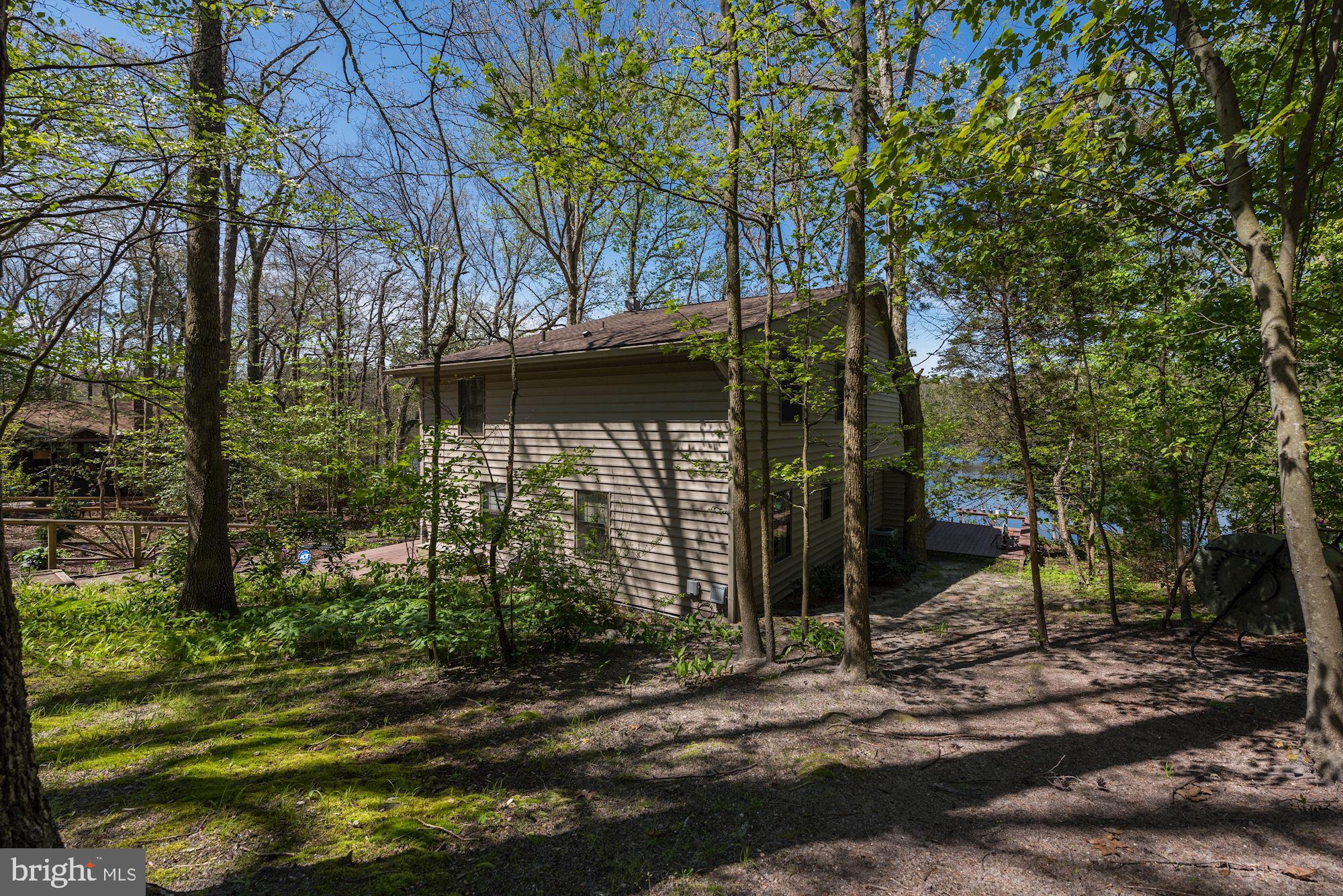 8 Robinson Road Medford, NJ 08055 - Photo 21 of 55 a view of a house with a tree