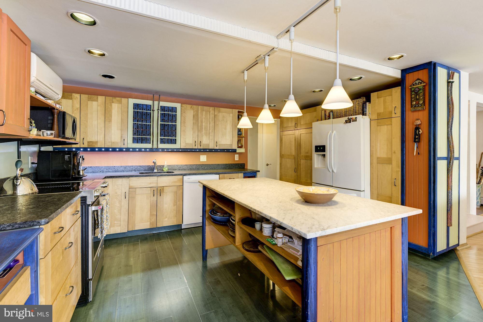 8 Robinson Road Medford, NJ 08055 - Photo 34 of 55 a kitchen that has a lot of cabinets in it and wooden floor