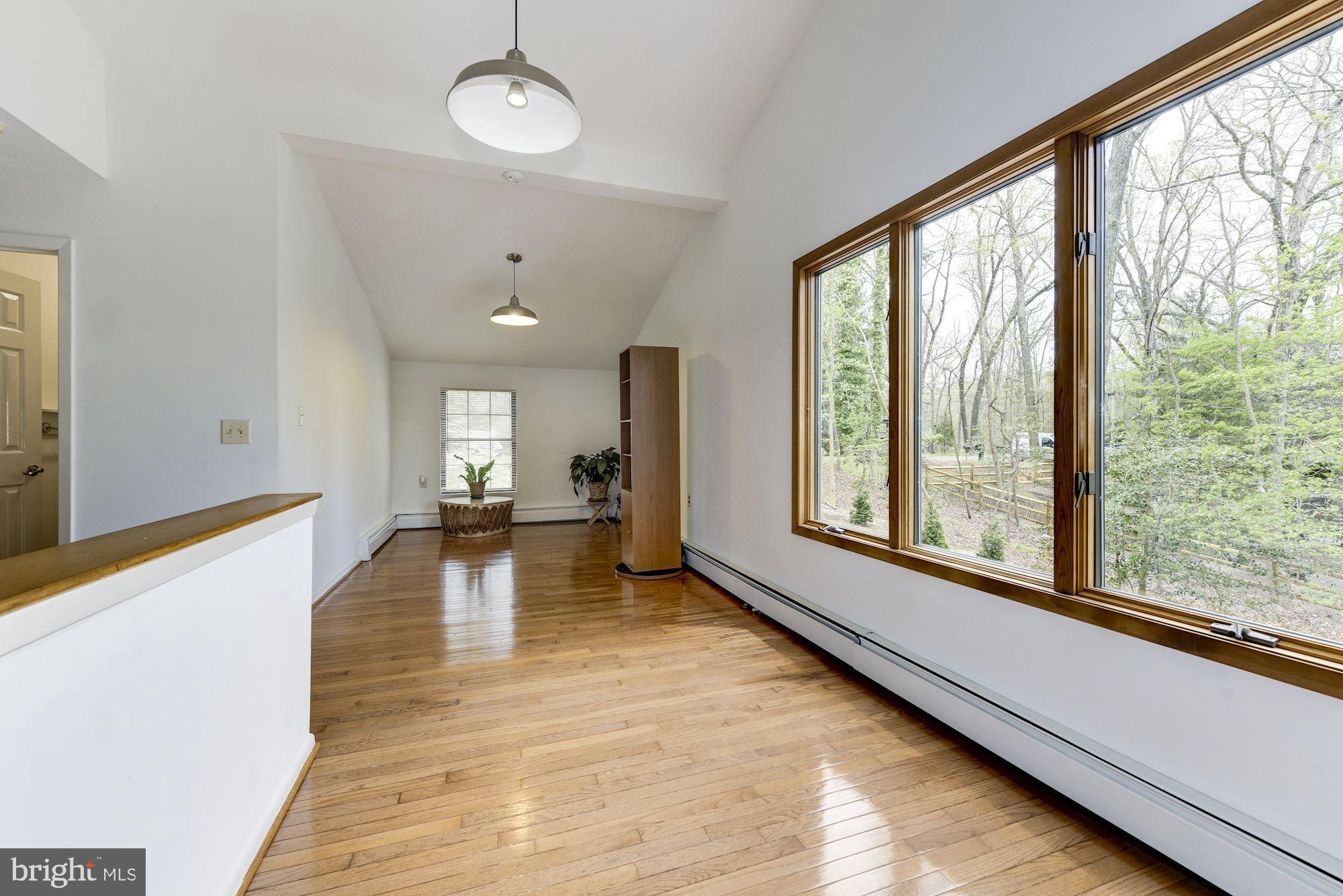 8 Robinson Road Medford, NJ 08055 - Photo 40 of 55 a view of a room with wooden floor and windows