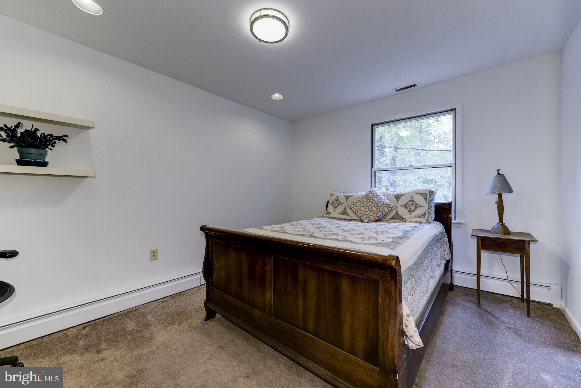 8 Robinson Road Medford, NJ 08055 - Photo 45 of 55 a bedroom with a bed and a window