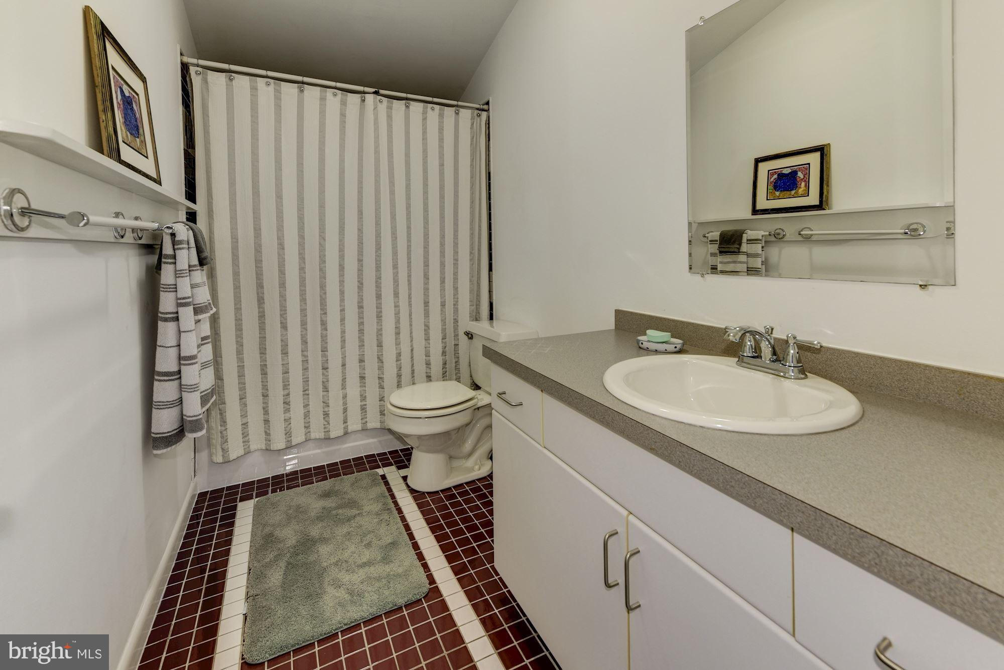 8 Robinson Road Medford, NJ 08055 - Photo 46 of 55 a bathroom with a sink and a mirror