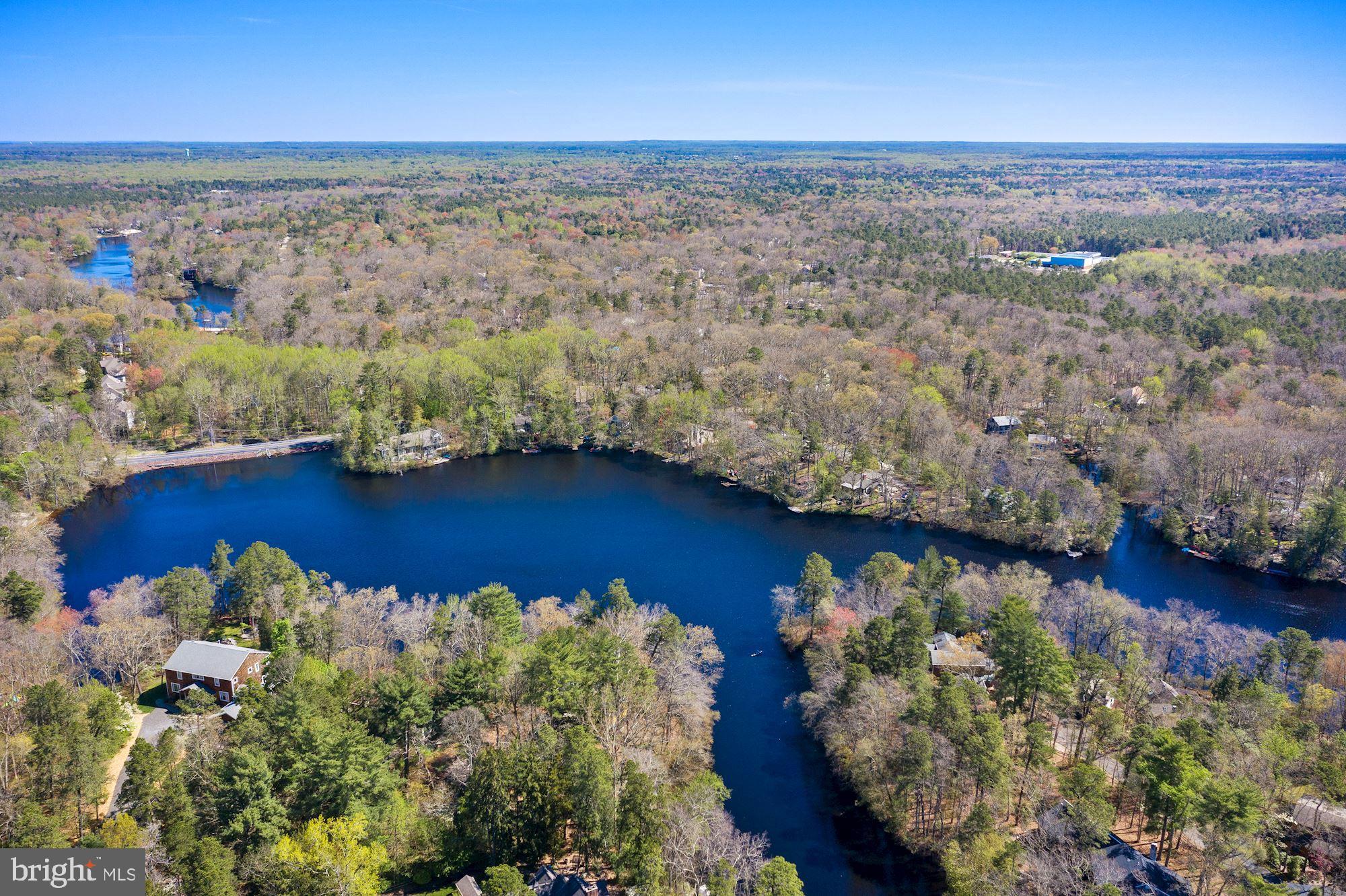 8 Robinson Road Medford, NJ 08055 - Photo 6 of 55 an aerial view of a house with a yard and lake view