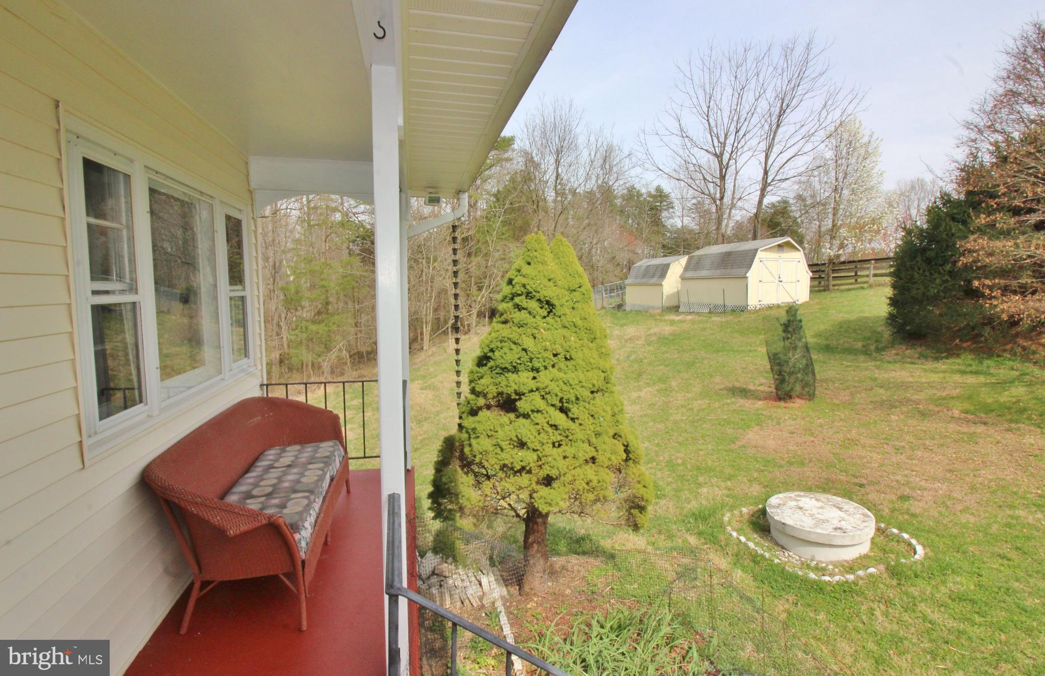 10166 Conde Road Marshall, VA 20115 - Photo 43 of 63 Side porch ideal for watching the sunrise.