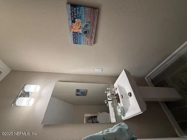 a view of livingroom and hallway with couch