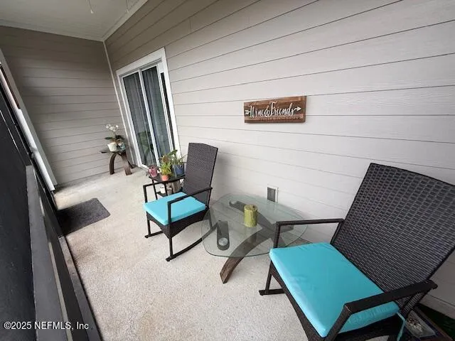 a view of a livingroom with furniture and a couch