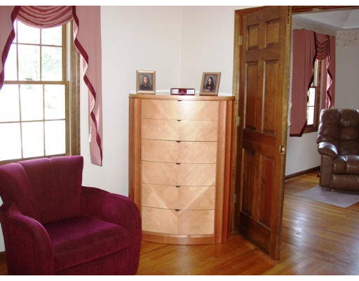 6 Partridge Way Canton, MA 02021 - Photo 14 of 25 a living room with furniture and a gate