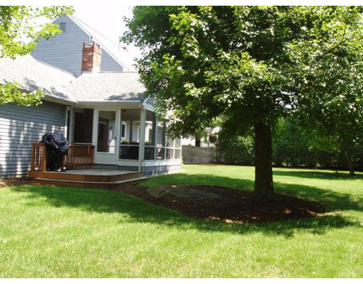 6 Partridge Way Canton, MA 02021 - Photo 23 of 25 a view of a house with backyard porch and sitting area