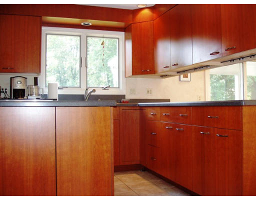 6 Partridge Way Canton, MA 02021 - Photo 9 of 25 a kitchen with granite countertop a sink window and cabinets