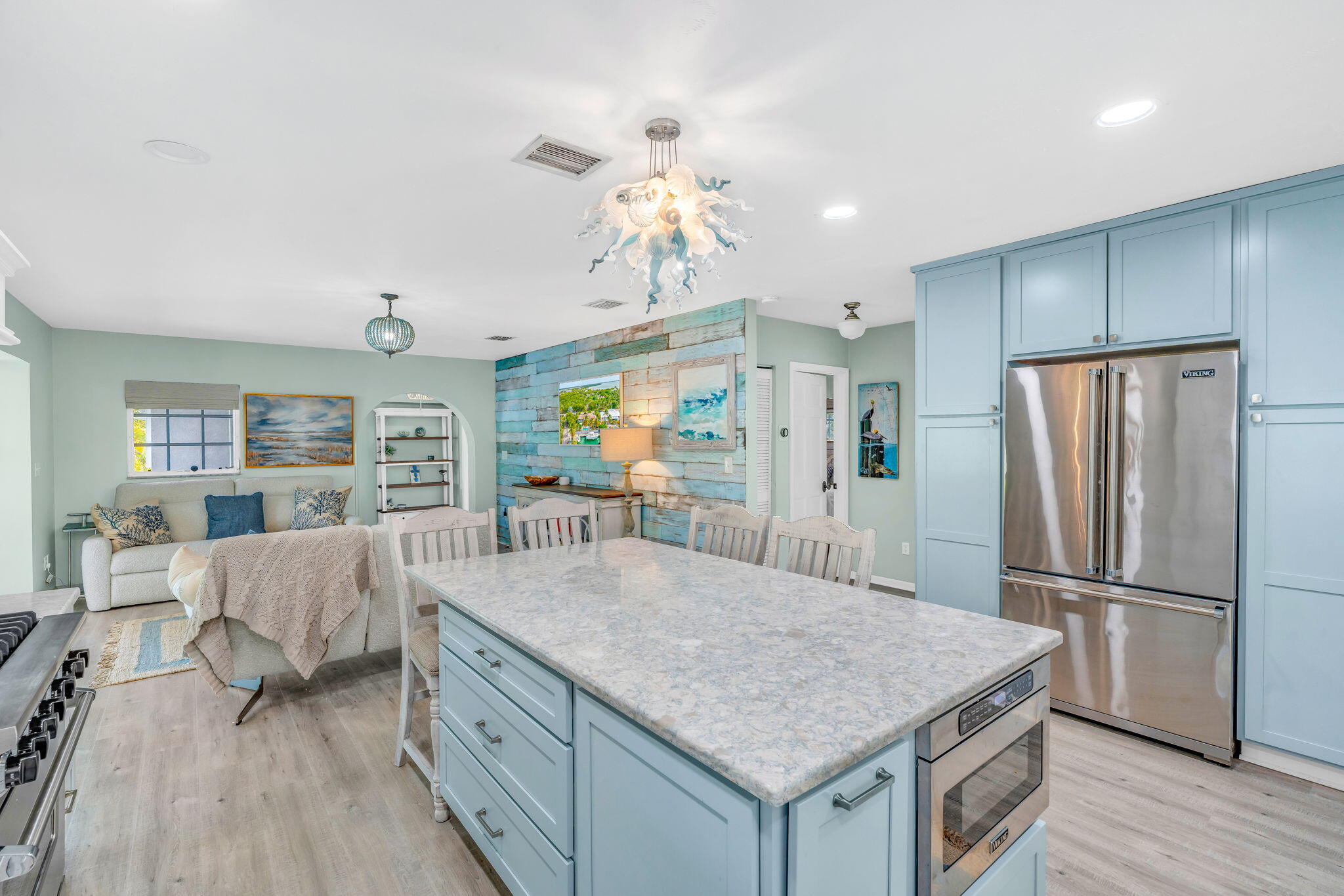 56 Colson Drive Cudjoe, FL 33042 - Photo 8 of 50 a kitchen with center island and stainless steel appliances
