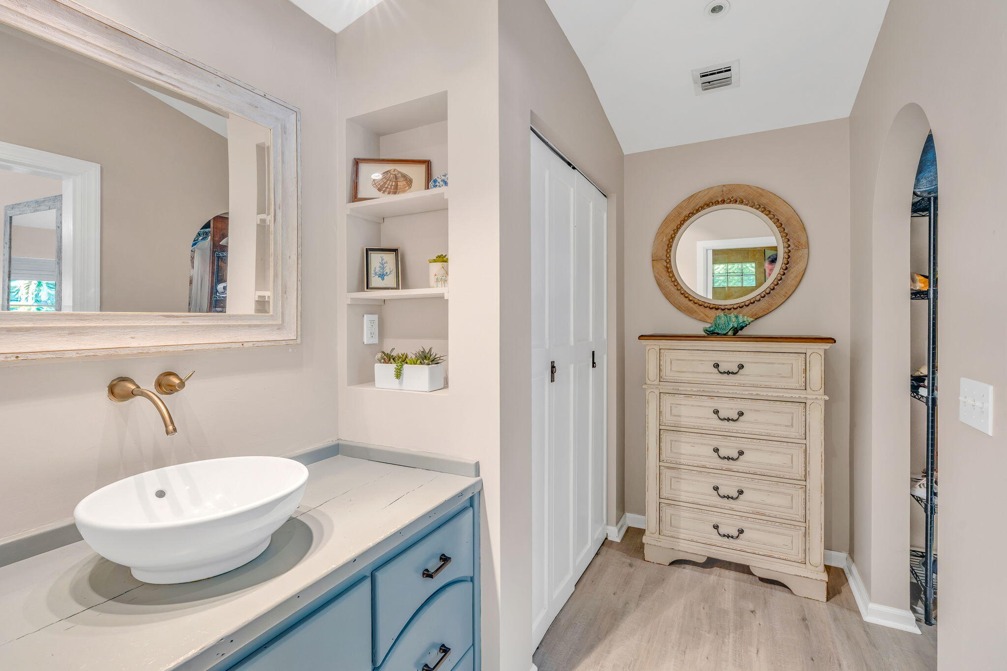 56 Colson Drive Cudjoe, FL 33042 - Photo 13 of 50 a bathroom with a toilet a sink and mirror