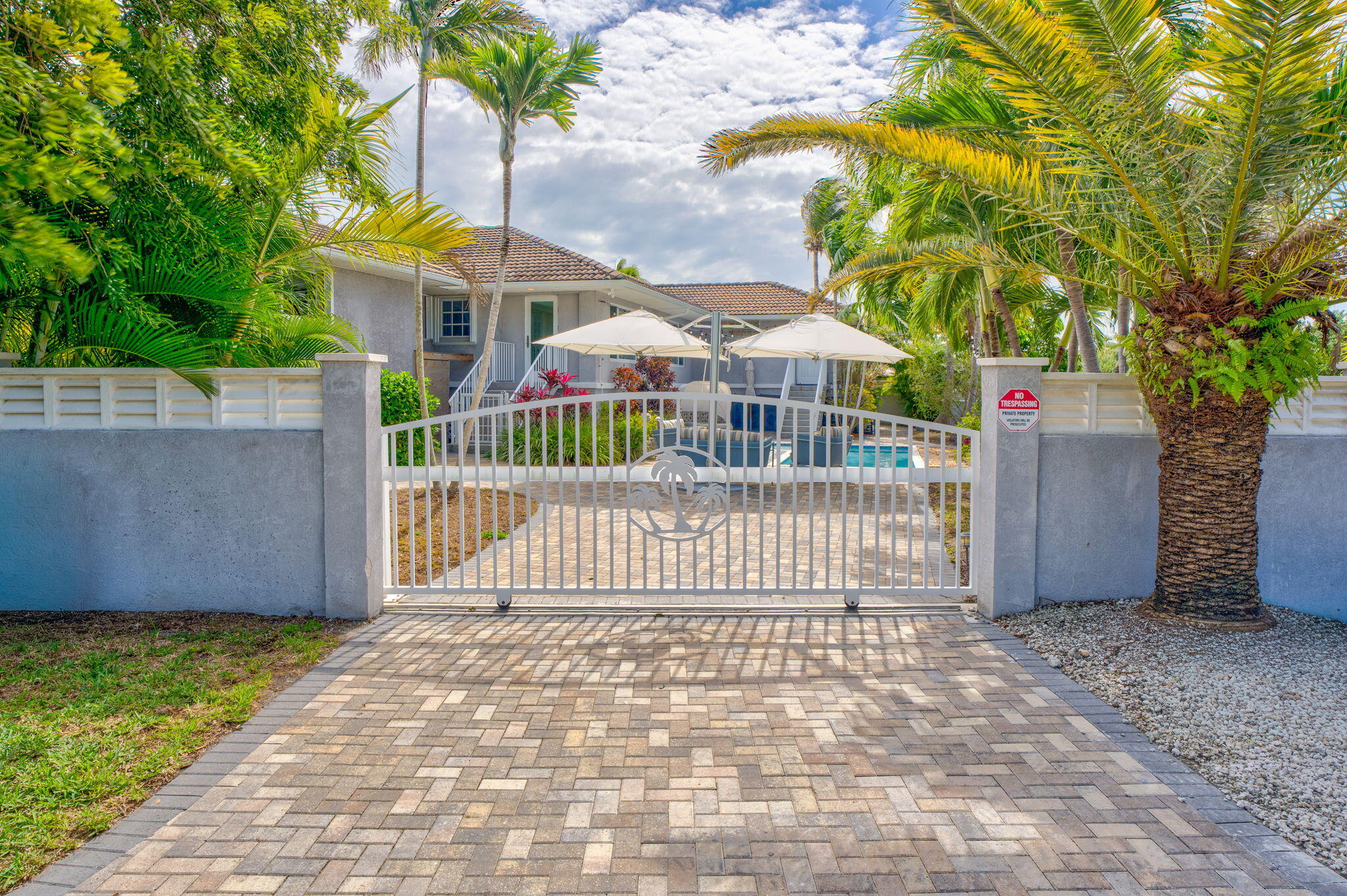 56 Colson Drive Cudjoe, FL 33042 - Photo 36 of 50 a view of a house with a small yard and plants