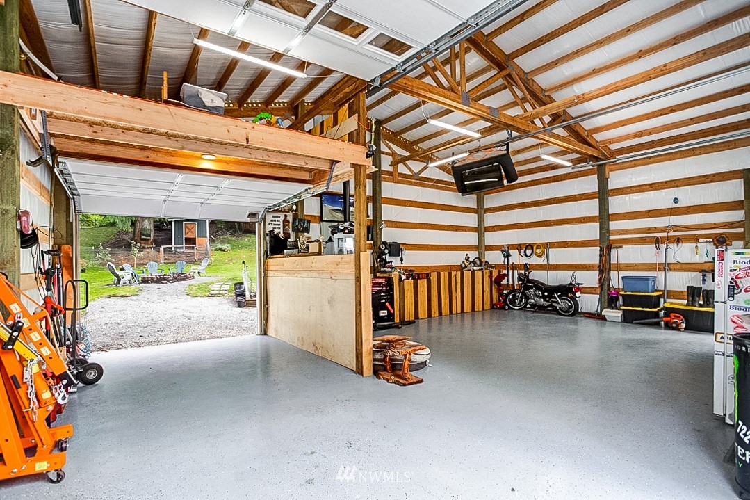 923 Newberg Road Snohomish, WA 98290 - Photo 22 of 22 a view of a garage with gym equipment