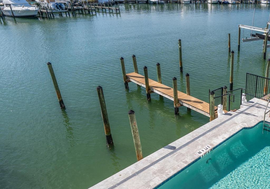 211 Dolphin Point, Unit 1 Clearwater Beach, FL 33767 - Photo 8 of 16 a view of a lake from a balcony
