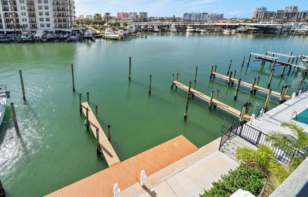211 Dolphin Point, Unit 1 Clearwater Beach, FL 33767 - Photo 10 of 16 an aerial view of a house with a lake view