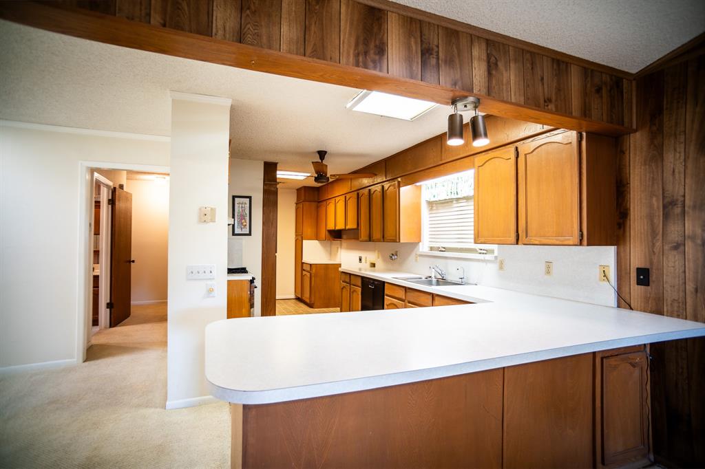 8312 Llano Avenue Benbrook, TX 76116 - Photo 18 of 40 a bathroom with a sink and a mirror