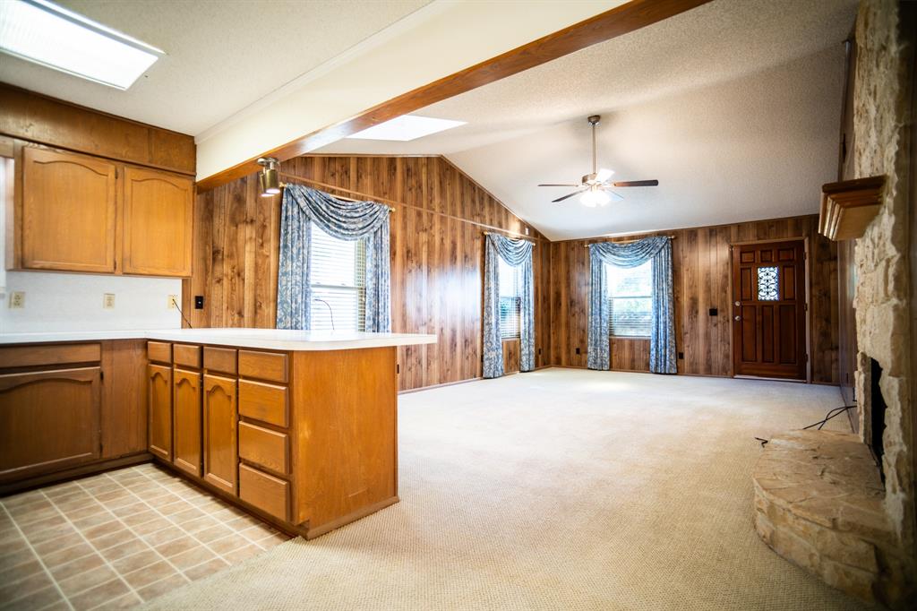 8312 Llano Avenue Benbrook, TX 76116 - Photo 31 of 40 a view of a kitchen with a sink and a window