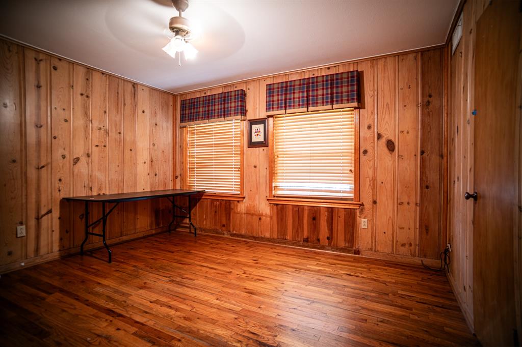 8312 Llano Avenue Benbrook, TX 76116 - Photo 33 of 40 wooden floor and windows in a room