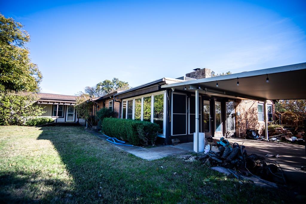 8312 Llano Avenue Benbrook, TX 76116 - Photo 5 of 40 a view of a house with backyard and sitting area