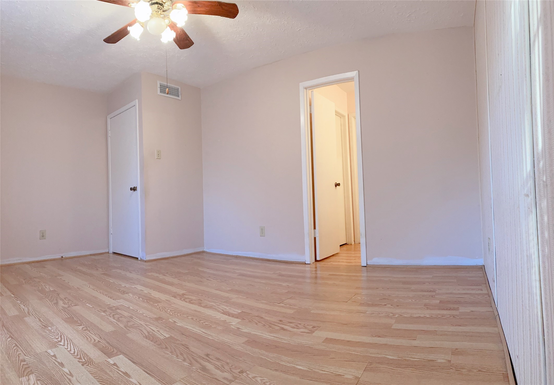 19518 Munsey Court Katy, TX 77449 - Photo 28 of 45 wooden floor in an empty room with a window