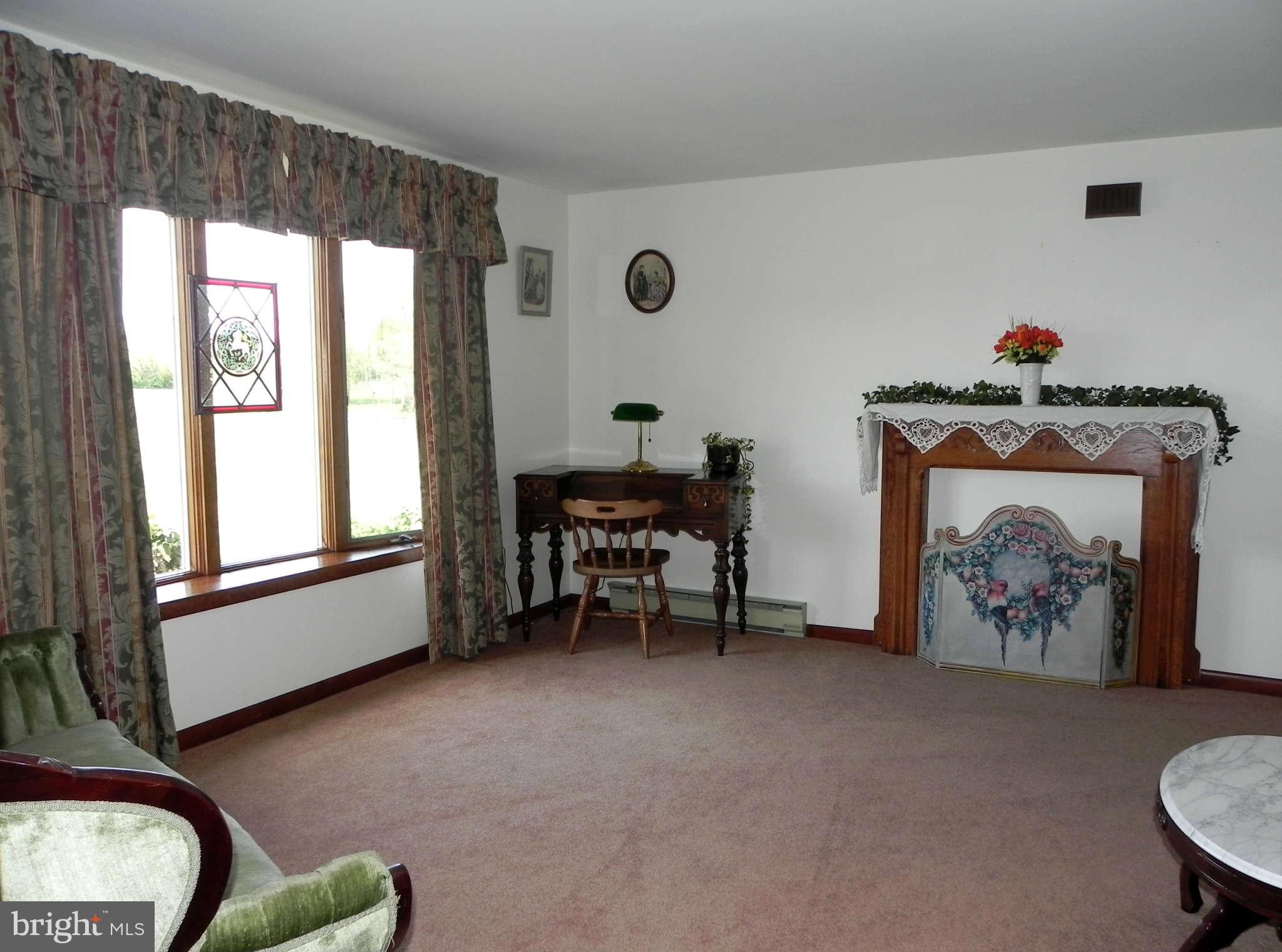 582 Earle Road Charles Town, WV 25414 - Photo 3 of 29 Living Room w/ Mantel (No Fireplace)