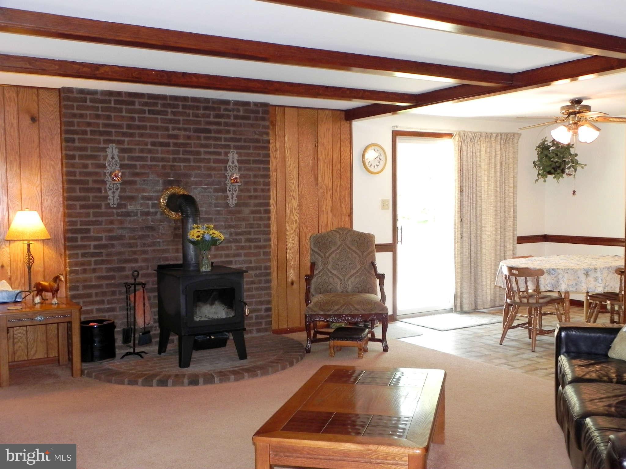 582 Earle Road Charles Town, WV 25414 - Photo 7 of 29 Family Room w/ Wood Stove